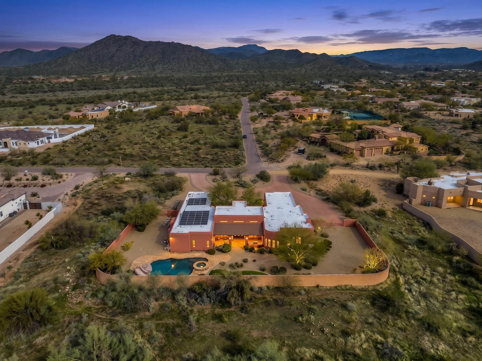 Aerial drone desert house pool mountains dusk real estate photography Cave Creek AZ | The Listing Bees