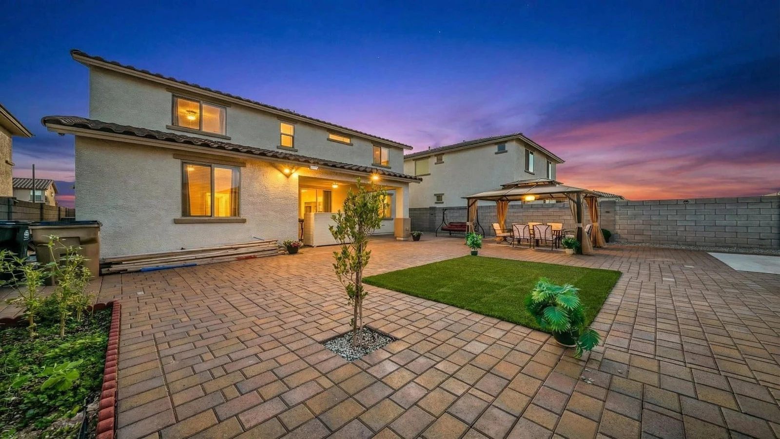 Backyard patio and lawn at dusk, Goodyear real estate photography