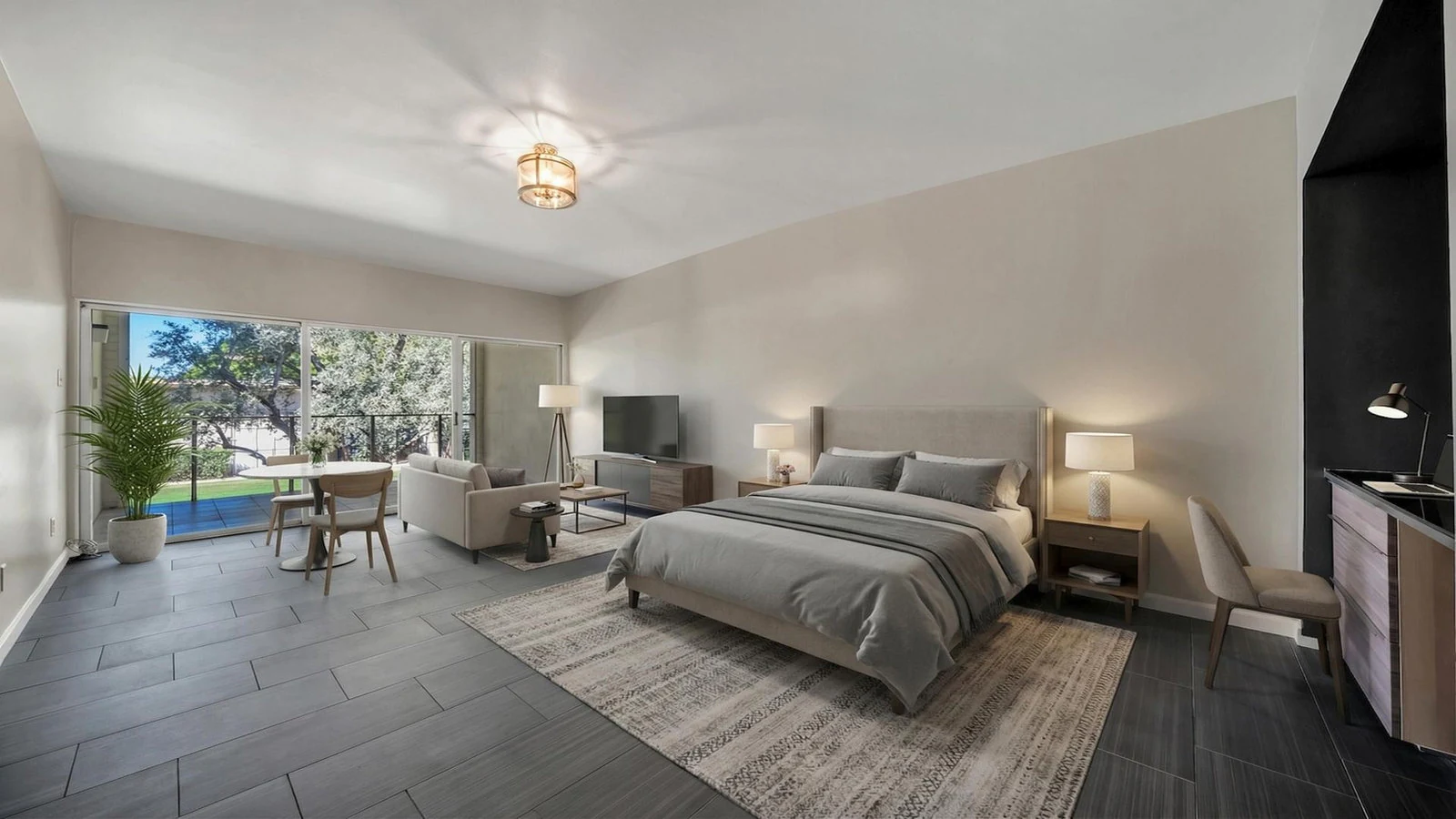 Contemporary studio apartment bedroom living space patio access real estate photography Scottsdale AZ | The Listing Bees
