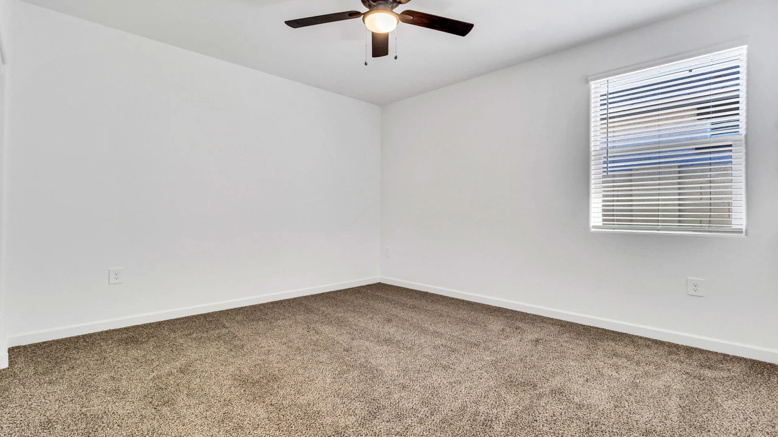 Empty bedroom white walls ceiling fan real estate photography Apache Junction AZ | The Listing Bees
