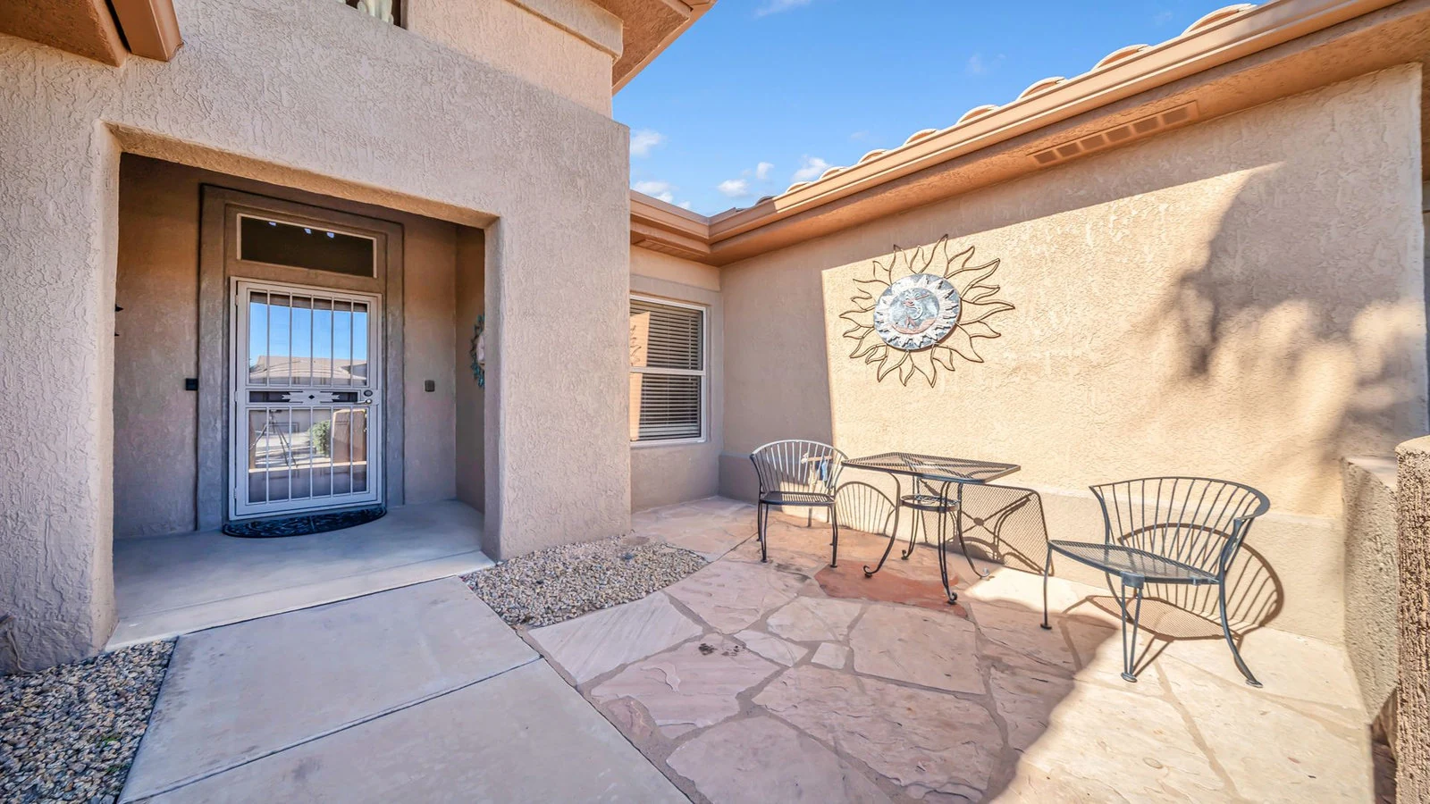 Entrance patio outdoor furniture sun art real estate photography Surprise AZ | The Listing Bees
