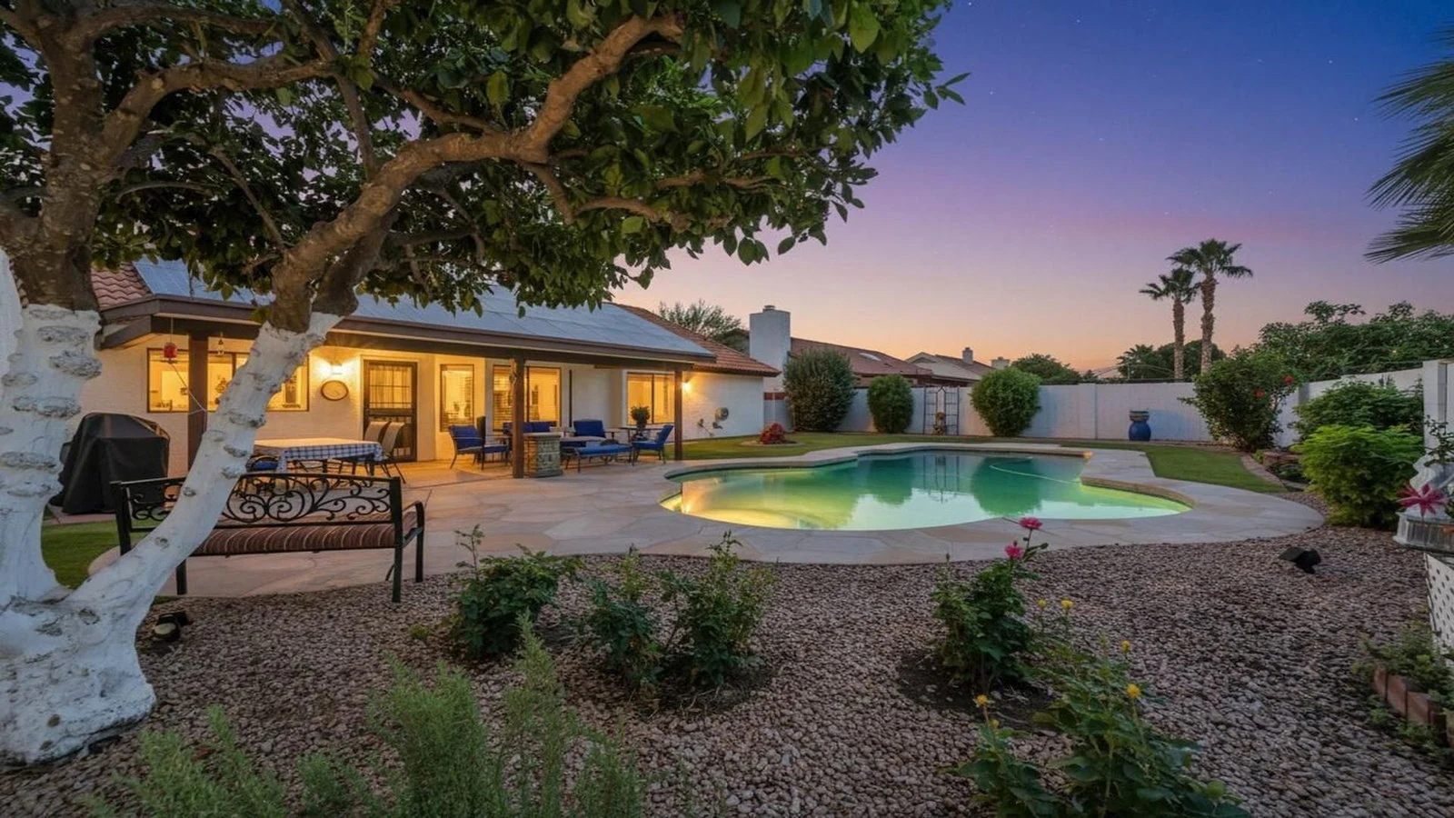 Evening Scottsdale backyard lit pool patio real estate photography Scottsdale AZ | The Listing Bees