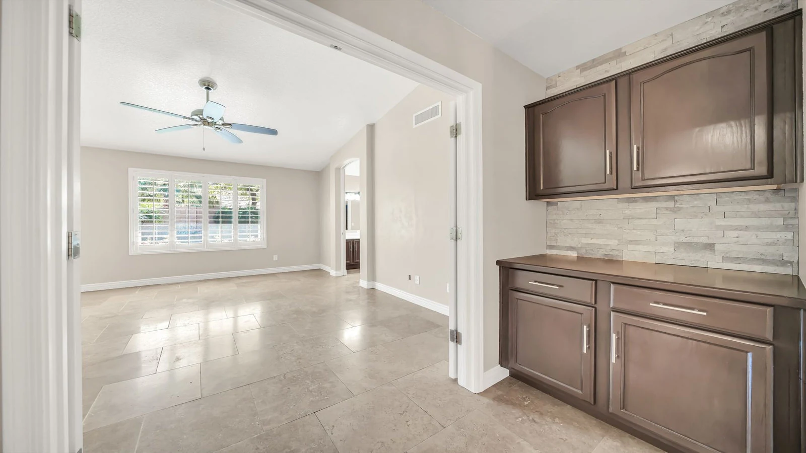 Interior empty room ceiling fan cabinet real estate photography Glendale AZ | The Listing Bees
