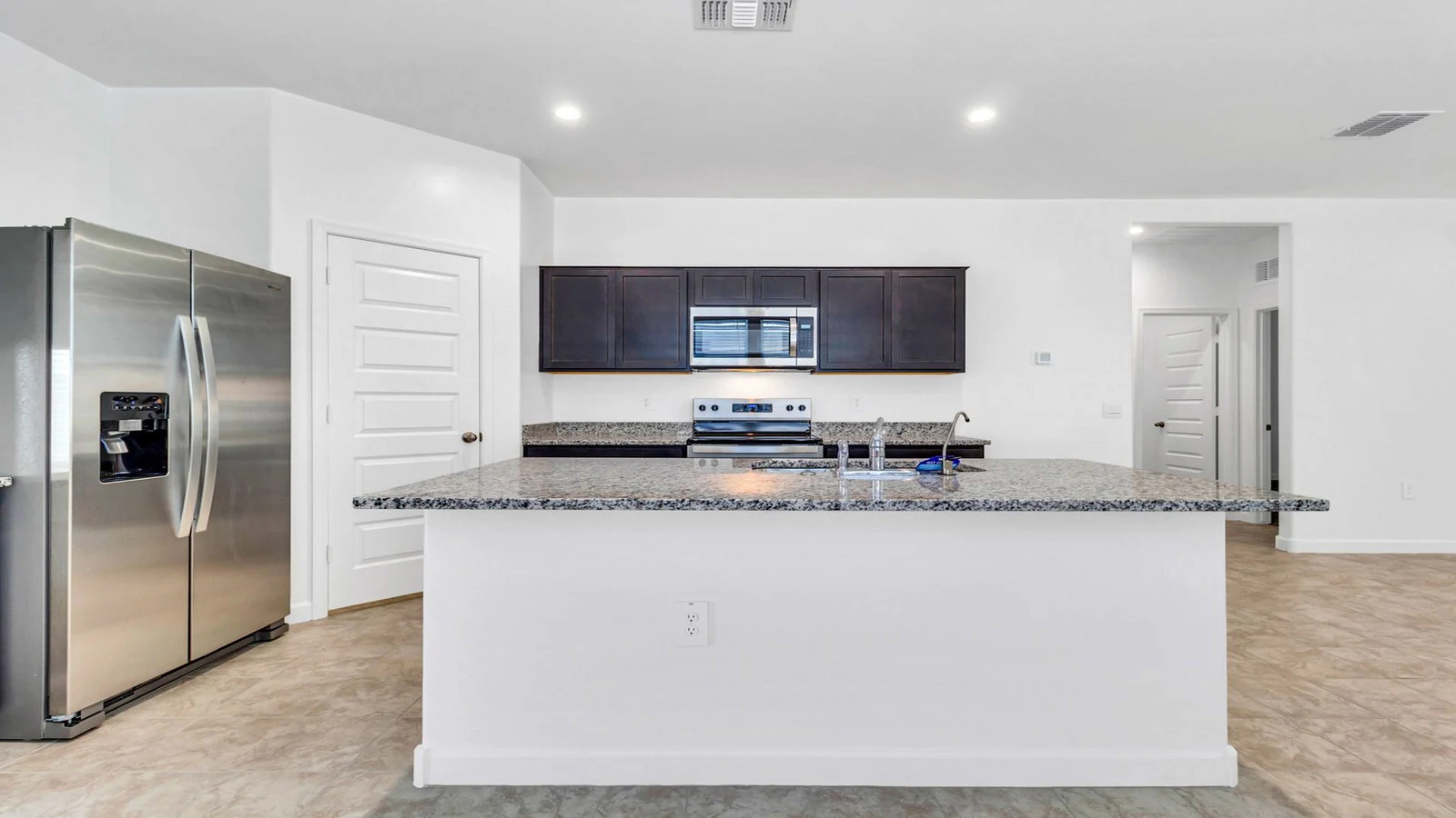 Kitchen stainless steel appliances island real estate photography Apache Junction AZ | The Listing Bees
