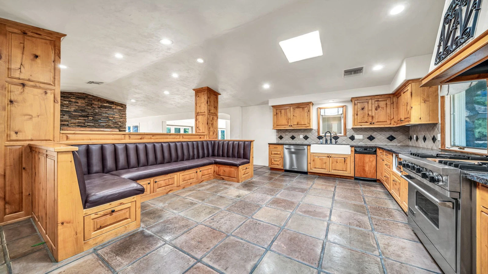 Kitchen with built-in bench real estate photography Paradise Valley AZ | The Listing Bees