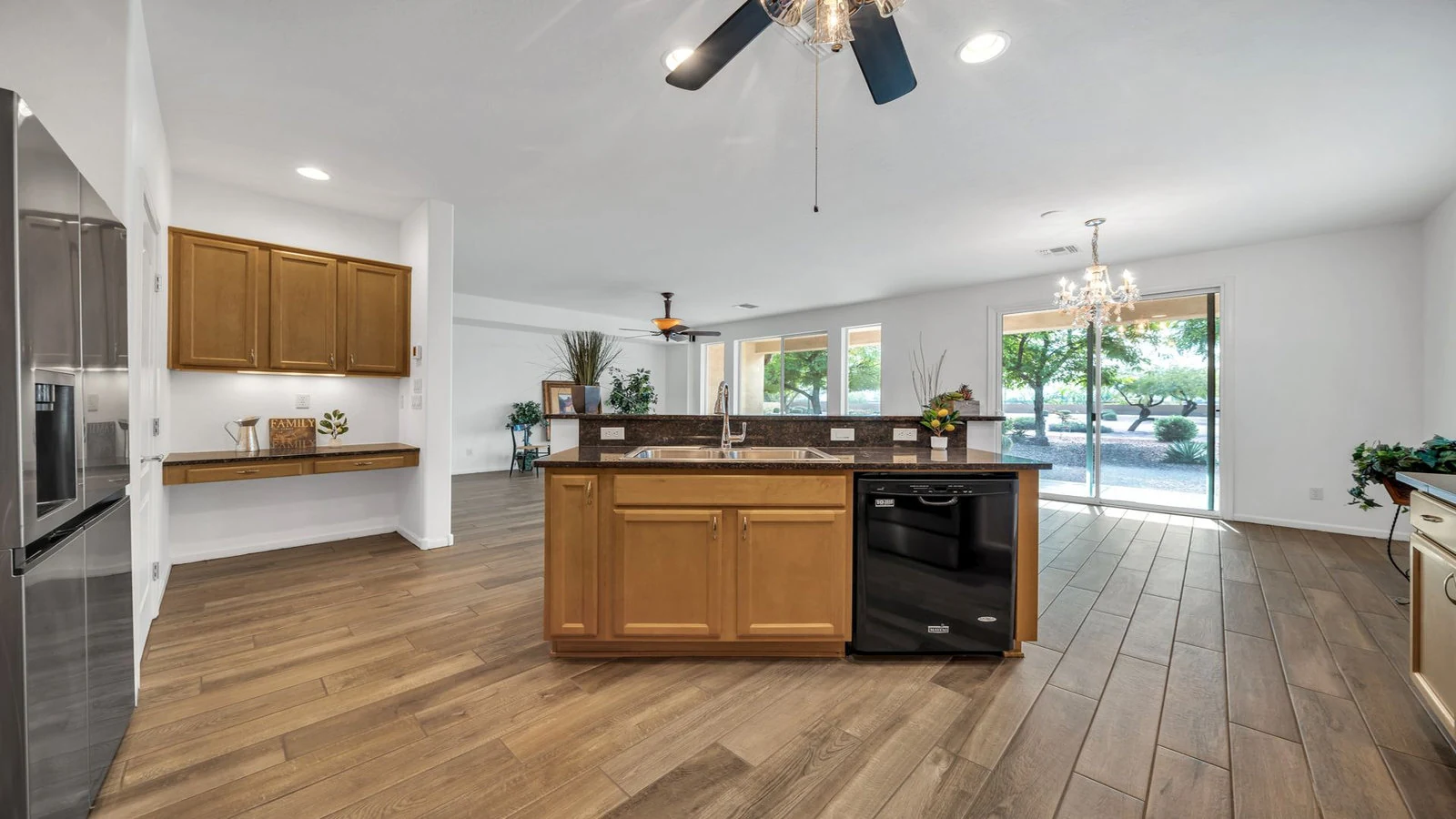 Kitchen wood cabinets island patio view real estate photography Goodyear AZ | The Listing Bees