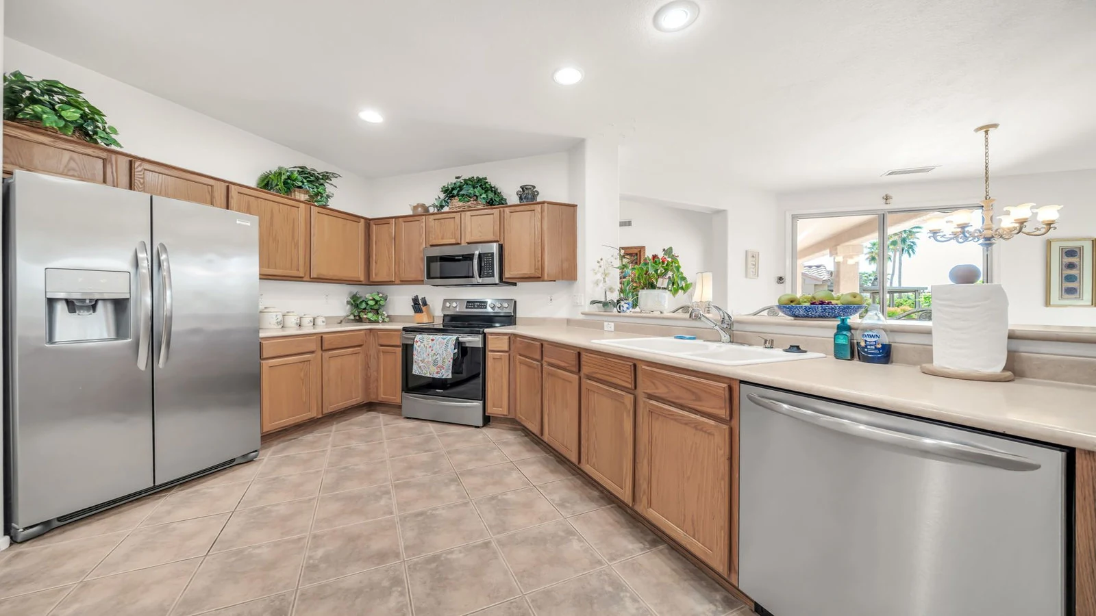 Kitchen wood cabinets stainless appliances real estate photography Surprise AZ | The Listing Bees