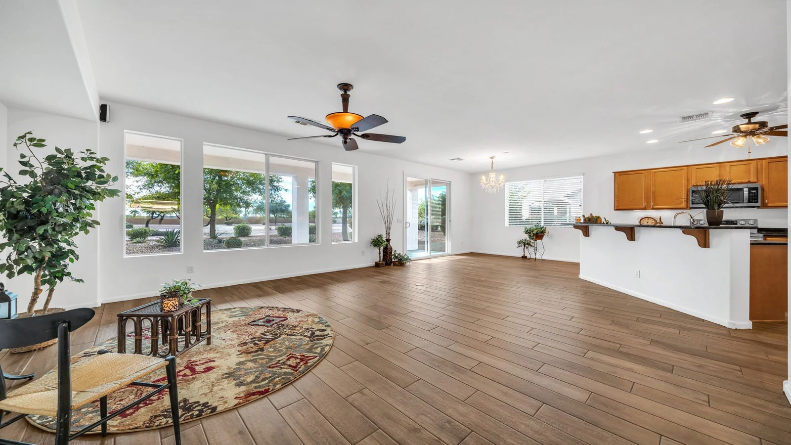 Living room kitchen large windows real estate photography Goodyear AZ | The Listing Bees