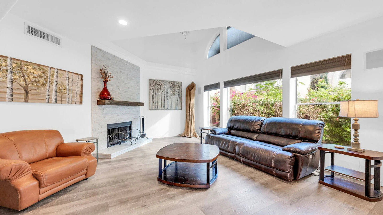 Living room leather sofa fireplace real estate photography Ahwatukee AZ | The Listing Bees