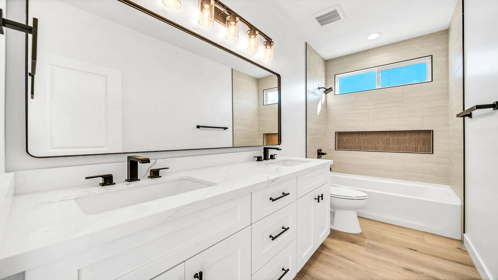Modern bathroom white double vanity bathtub real estate photography Surprise AZ | The Listing Bees