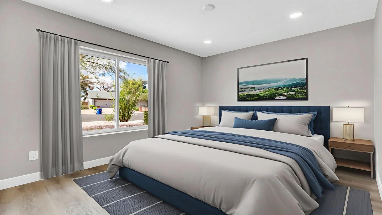 Modern bedroom blue bed nightstands window real estate photography Tempe AZ | The Listing Bees