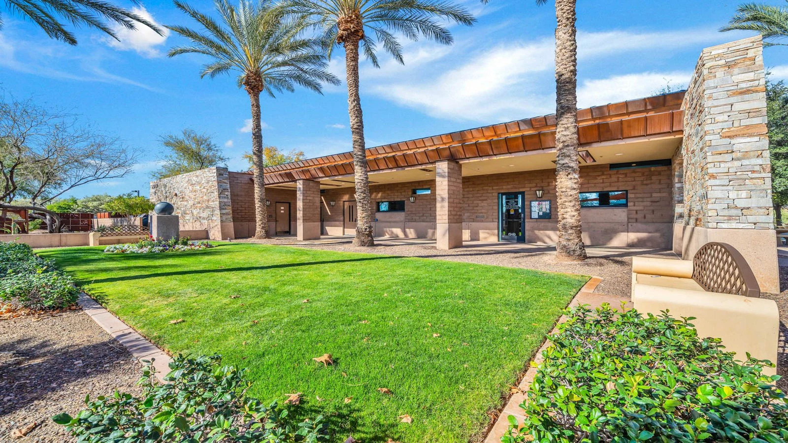 Modern brick building covered walkway palm trees real estate photography Peoria AZ | The Listing Bees