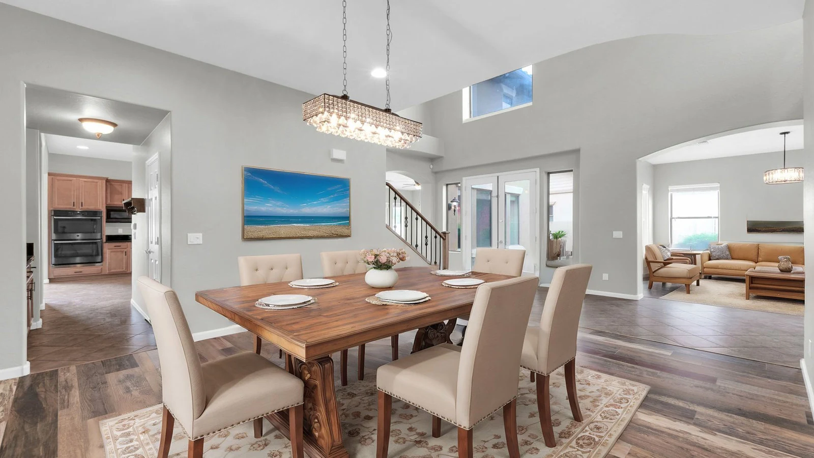 Modern dining room wood table chairs living area real estate photography Queen Creek AZ | The Listing Bees