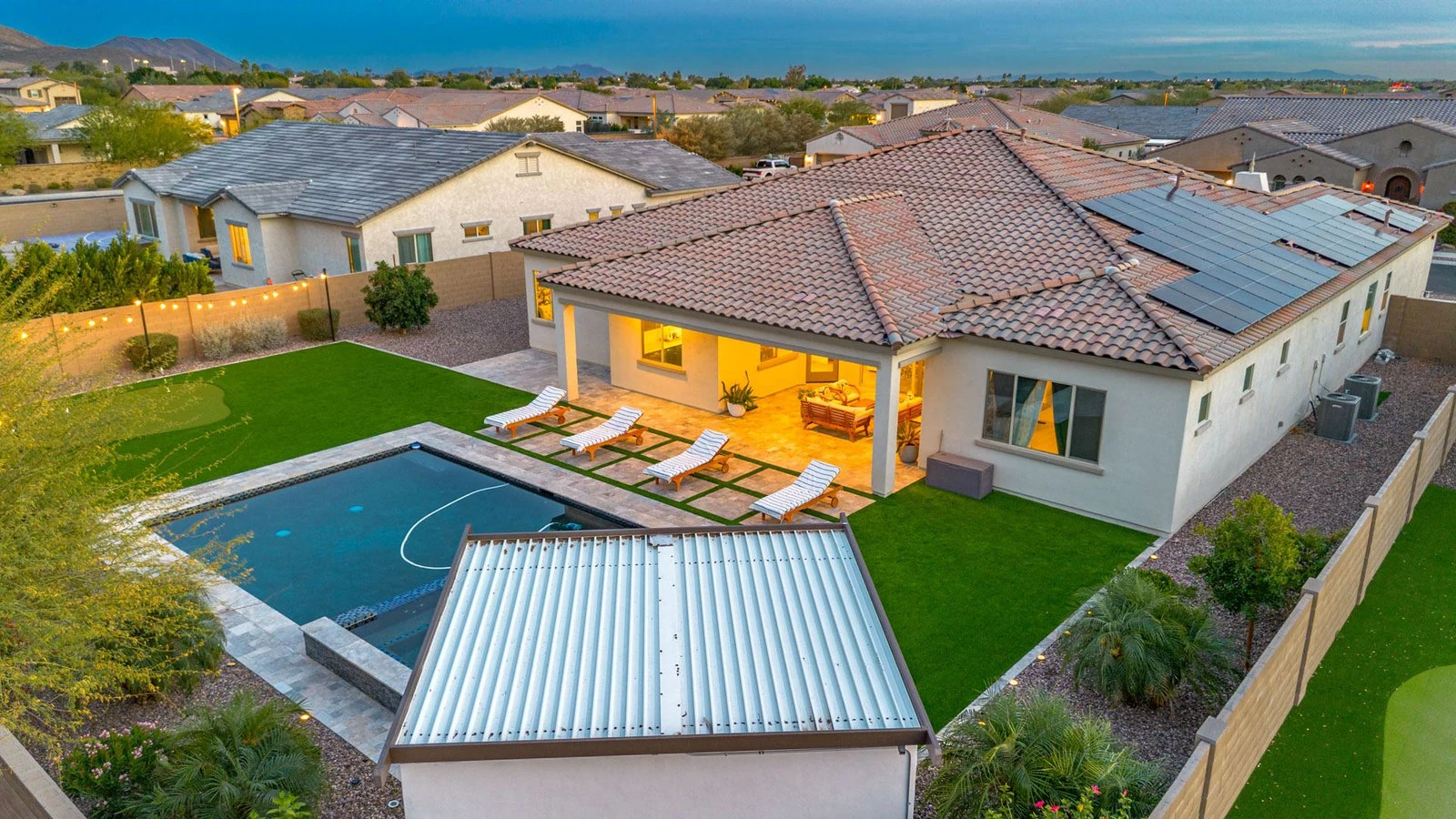Modern house backyard pool solar panels real estate photography Peoria AZ | The Listing Bees