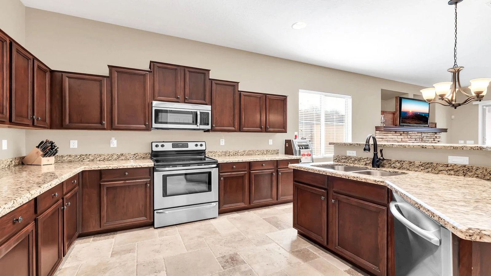 Modern kitchen dark cabinets stainless appliances real estate photography Gold Canyon AZ | The Listing Bees