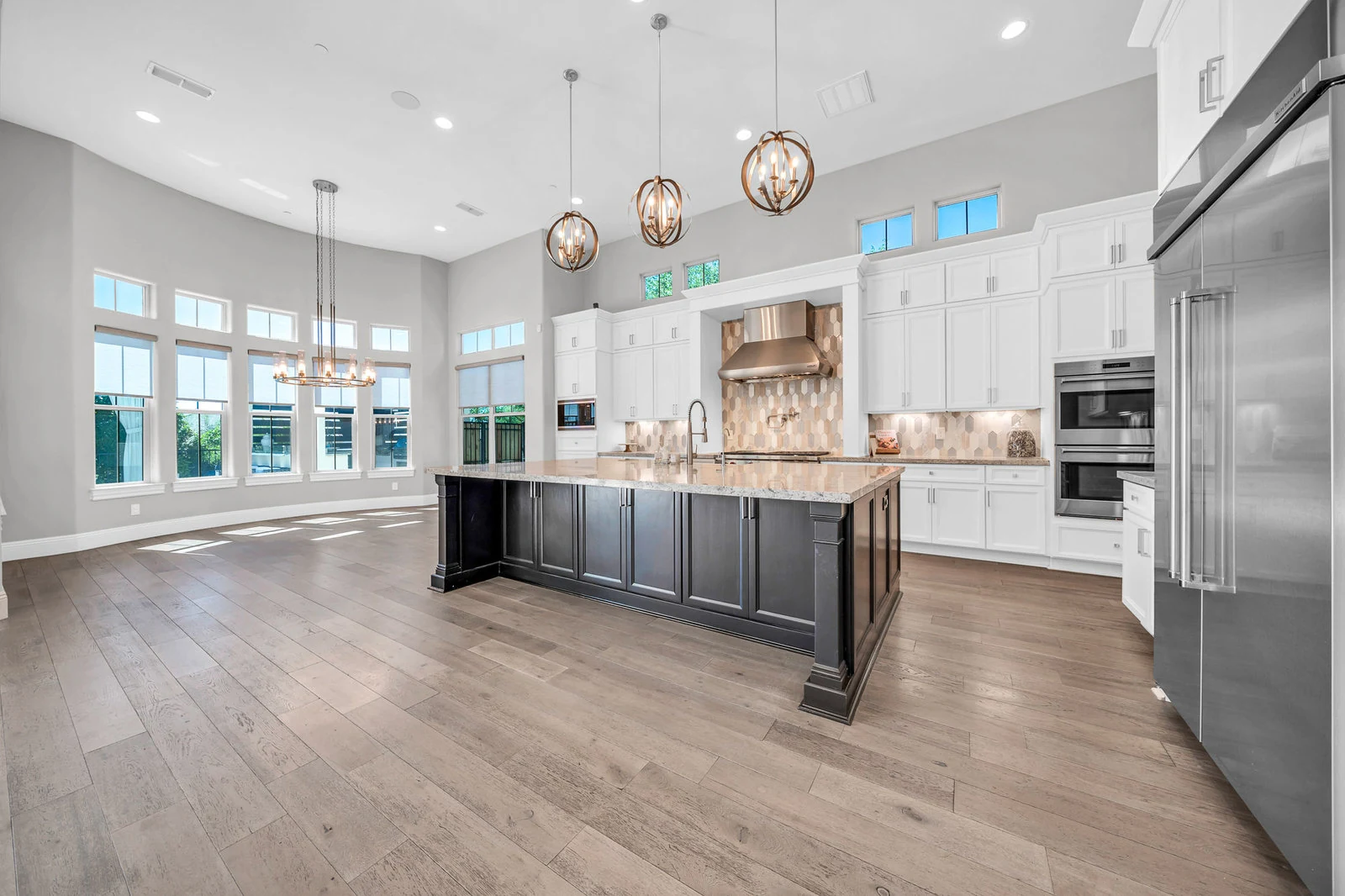Modern kitchen large island open living area real estate photography Cave Creek AZ | The Listing Bees