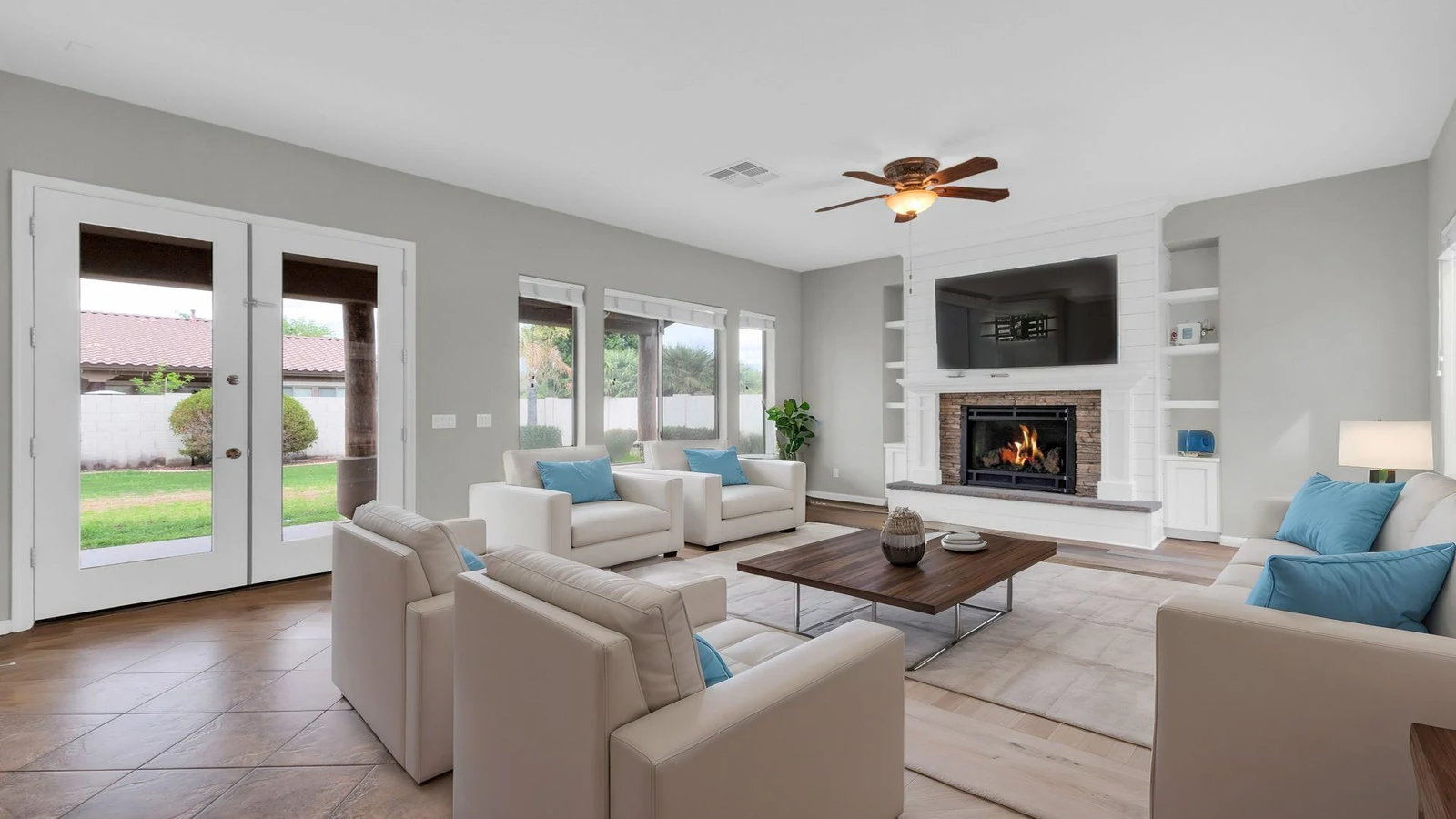 Modern living room fireplace patio doors real estate photography Queen Creek AZ | The Listing Bees