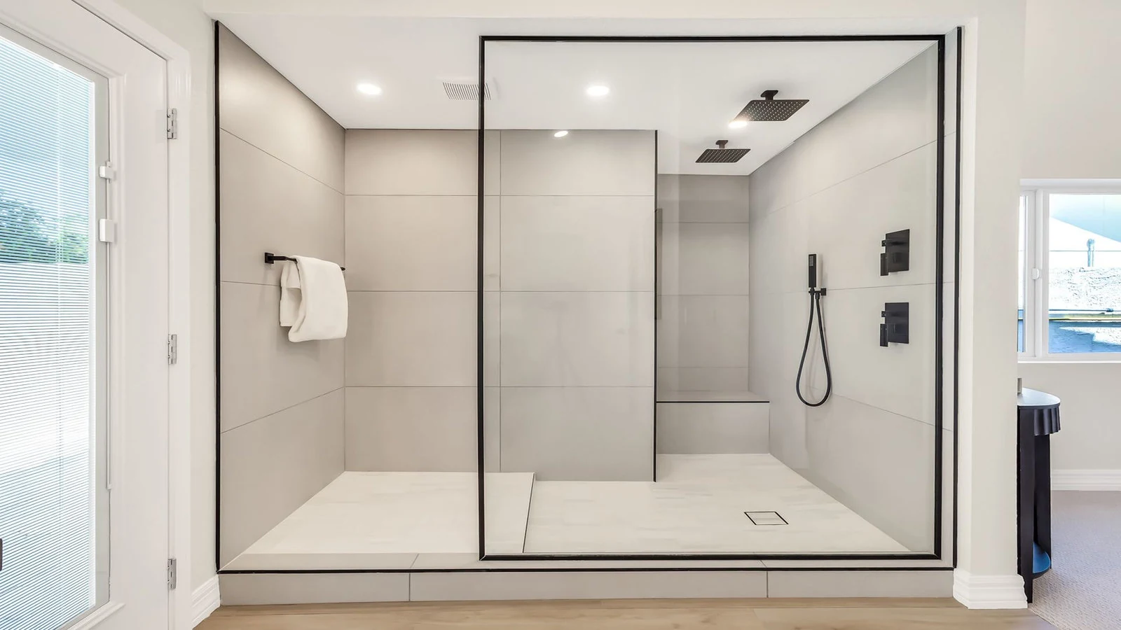 Modern walk-in shower glass walls gray tiles real estate photography Tempe AZ | The Listing Bees