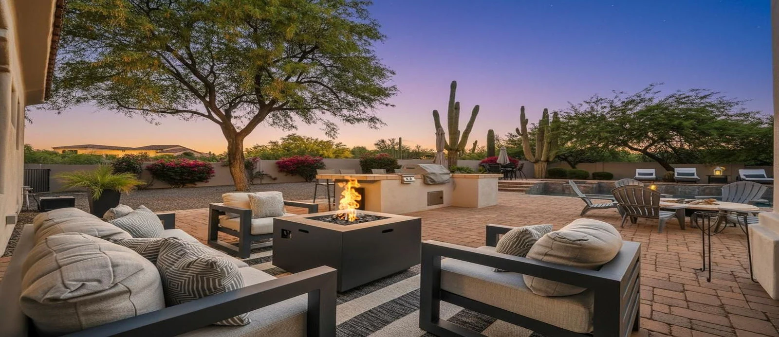 Outdoor patio fire pit modern seating desert cacti dusk real estate photography Scottsdale AZ | The Listing Bees