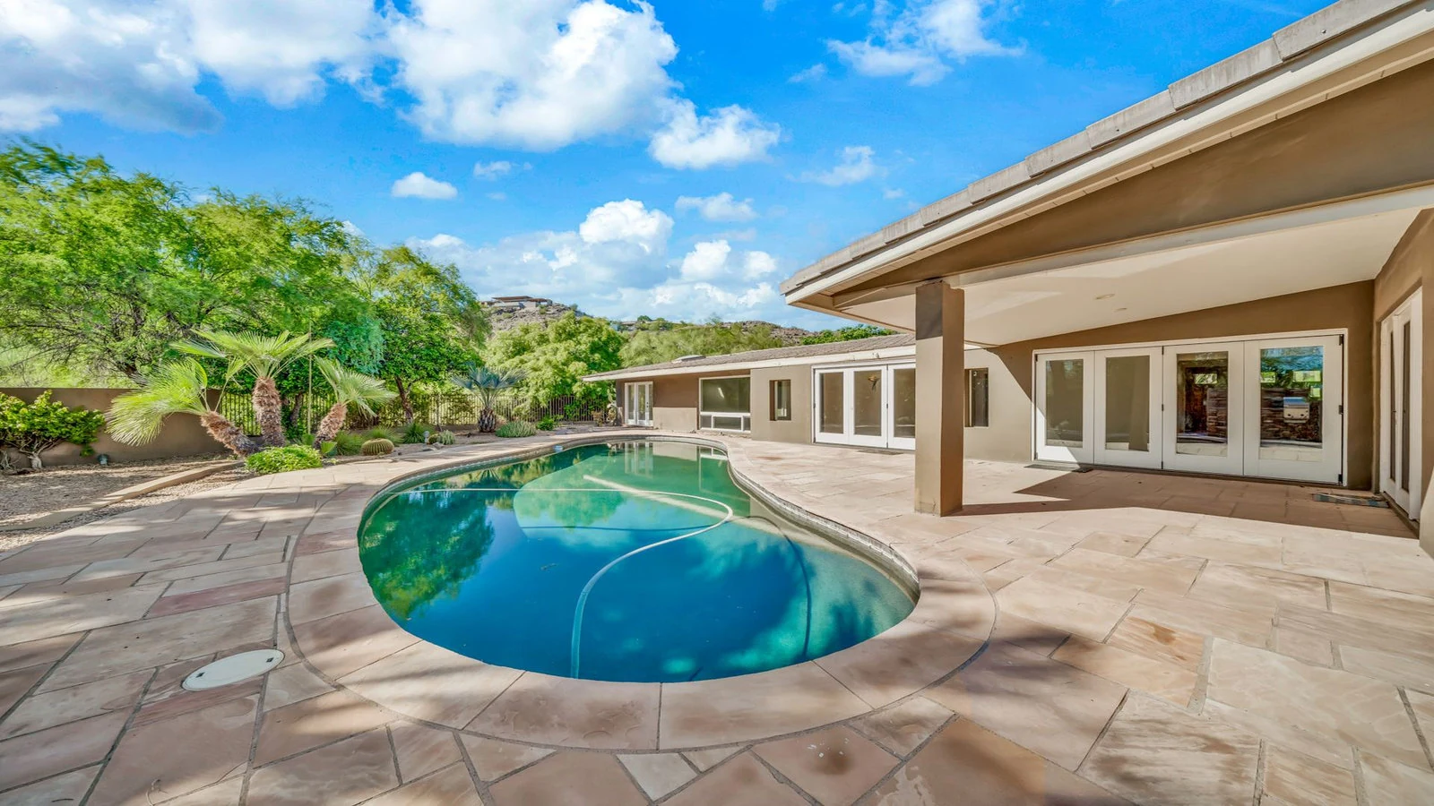 Pool backyard large patio real estate photography Paradise Valley AZ | The Listing Bees