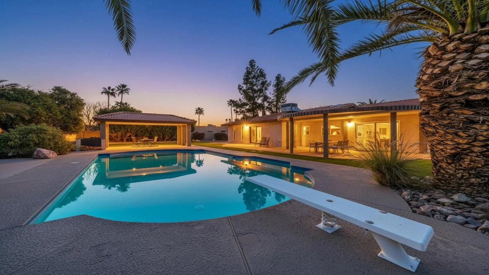 House lit pool diving board dusk real estate photography Glendale AZ | The Listing Bees