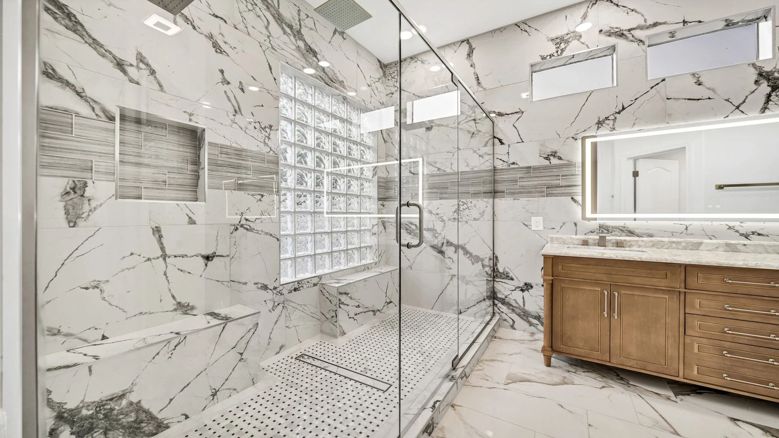 Elegant bathroom marble glass shower wood vanity real estate photography Goodyear AZ | The Listing Bees