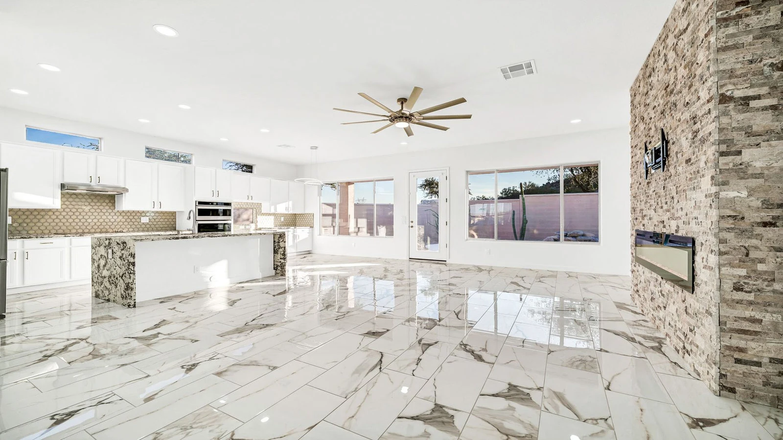 Open plan living room kitchen real estate photography Goodyear AZ | The Listing Bees