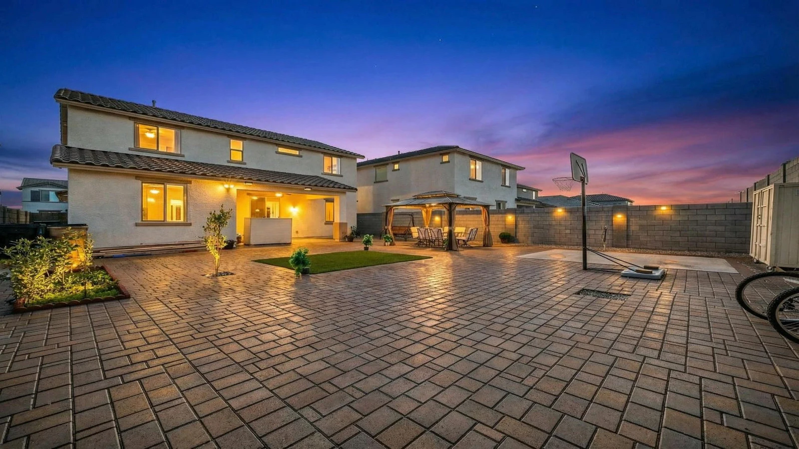 Backyard patio basketball hoop dusk real estate photography Goodyear AZ | The Listing Bees