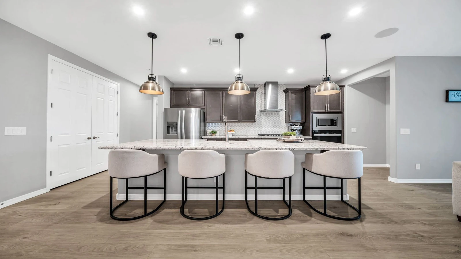 Modern kitchen large island bar stools real estate photography Peoria AZ | The Listing Bees
