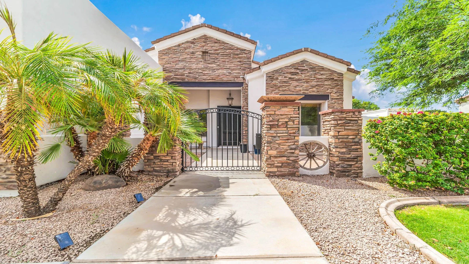 House stone facade gated entrance palm trees real estate photography Queen Creek AZ | The Listing Bees