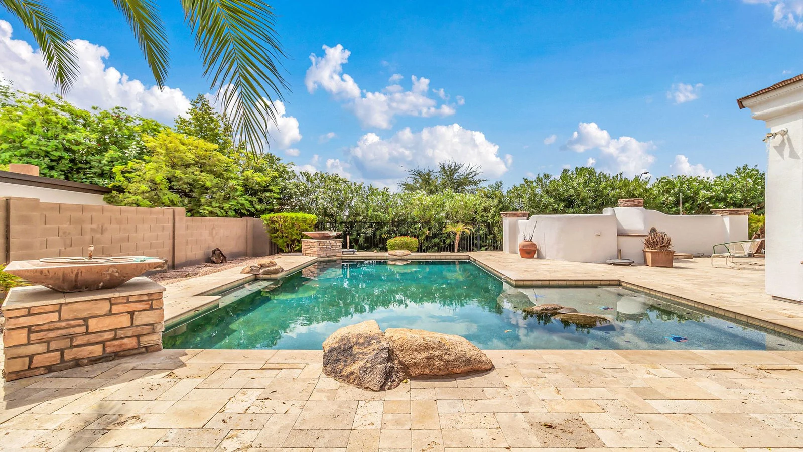 Swimming pool stone patio fountain real estate photography Queen Creek AZ | The Listing Bees