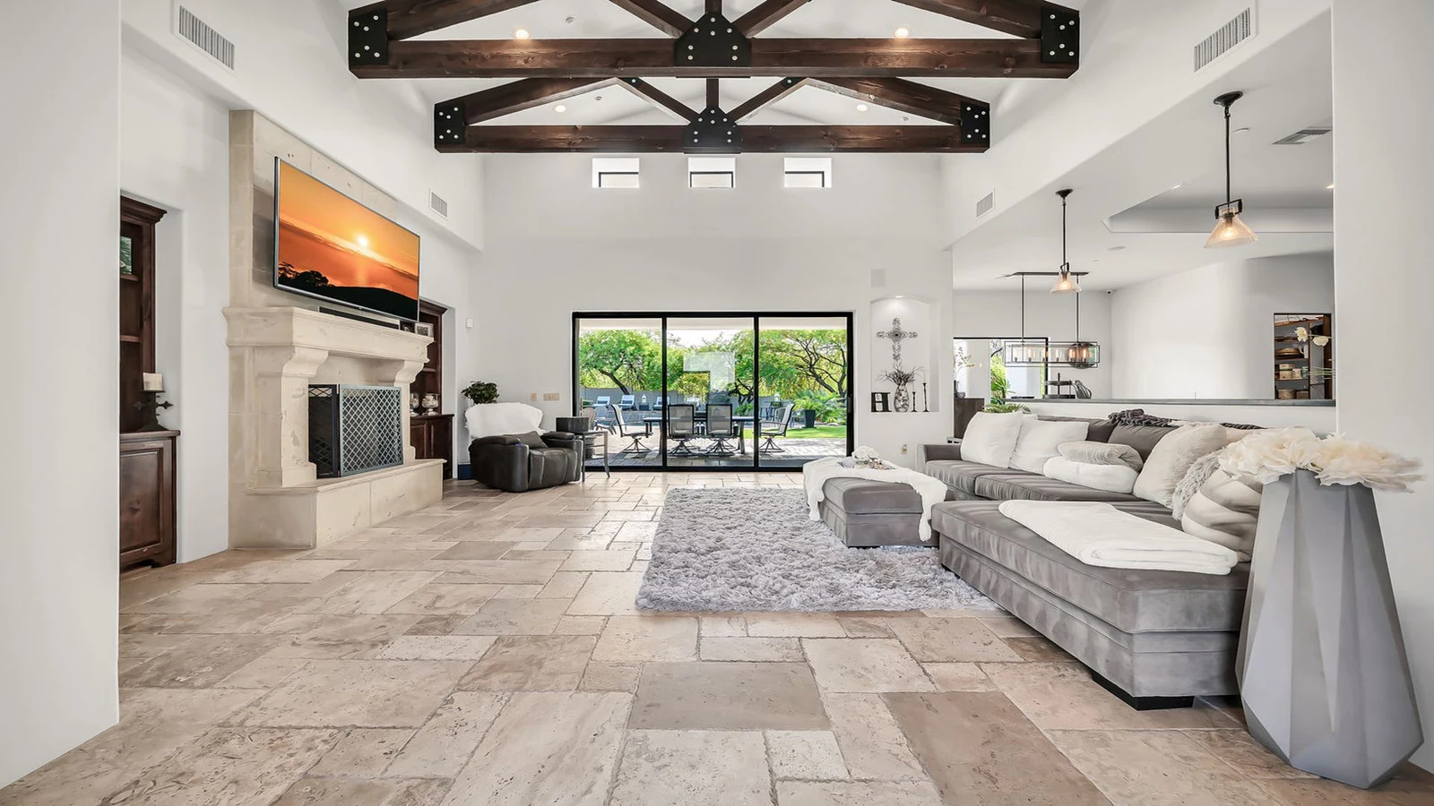 Spacious living room vaulted ceiling fireplace real estate photography Scottsdale AZ | The Listing Bees