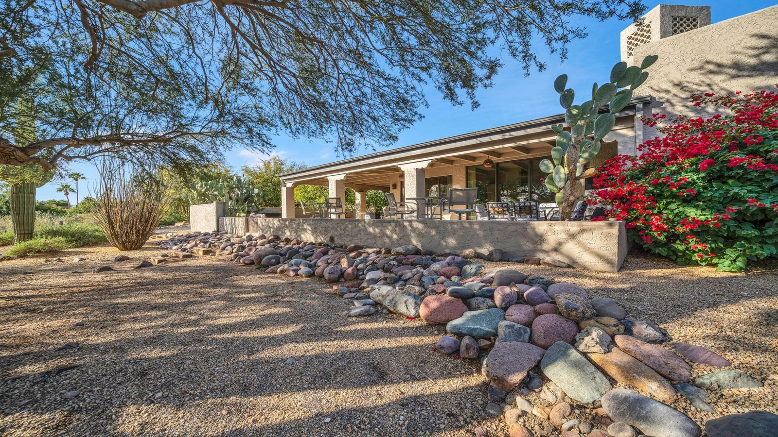 Rio Verde home with covered patio and desert landscaping