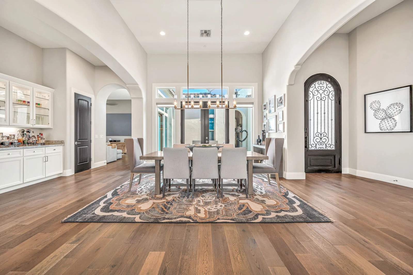 Spacious dining room large table modern chandelier real estate photography Cave Creek AZ | The Listing Bees