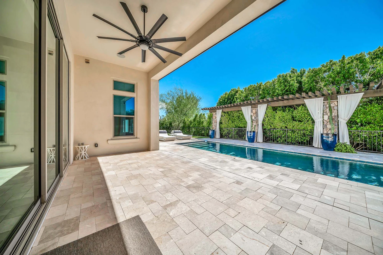 Spacious patio pool cabanas lush landscaping real estate photography Cave Creek AZ | The Listing Bees