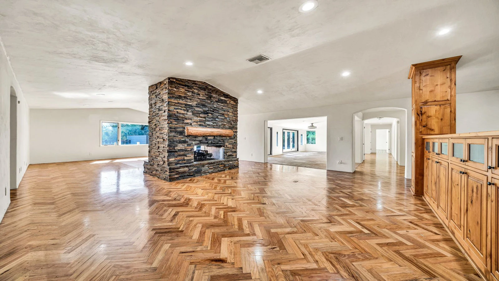 Stone fireplace herringbone floor real estate photography Paradise Valley AZ | The Listing Bees