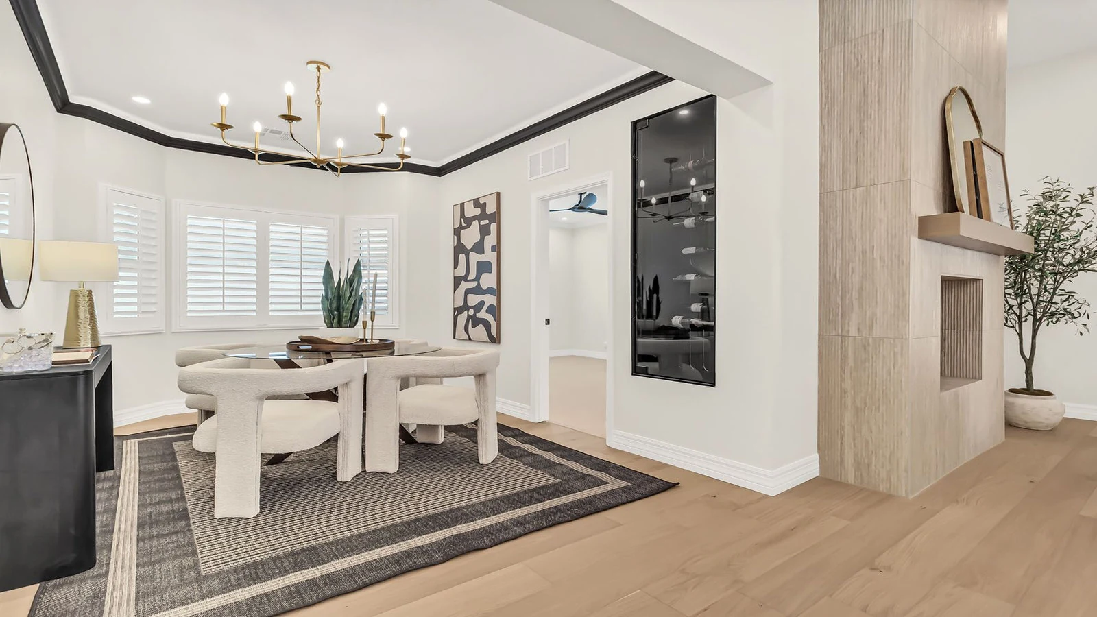 Stylish living space bay window chandelier fireplace real estate photography Tempe AZ | The Listing Bees