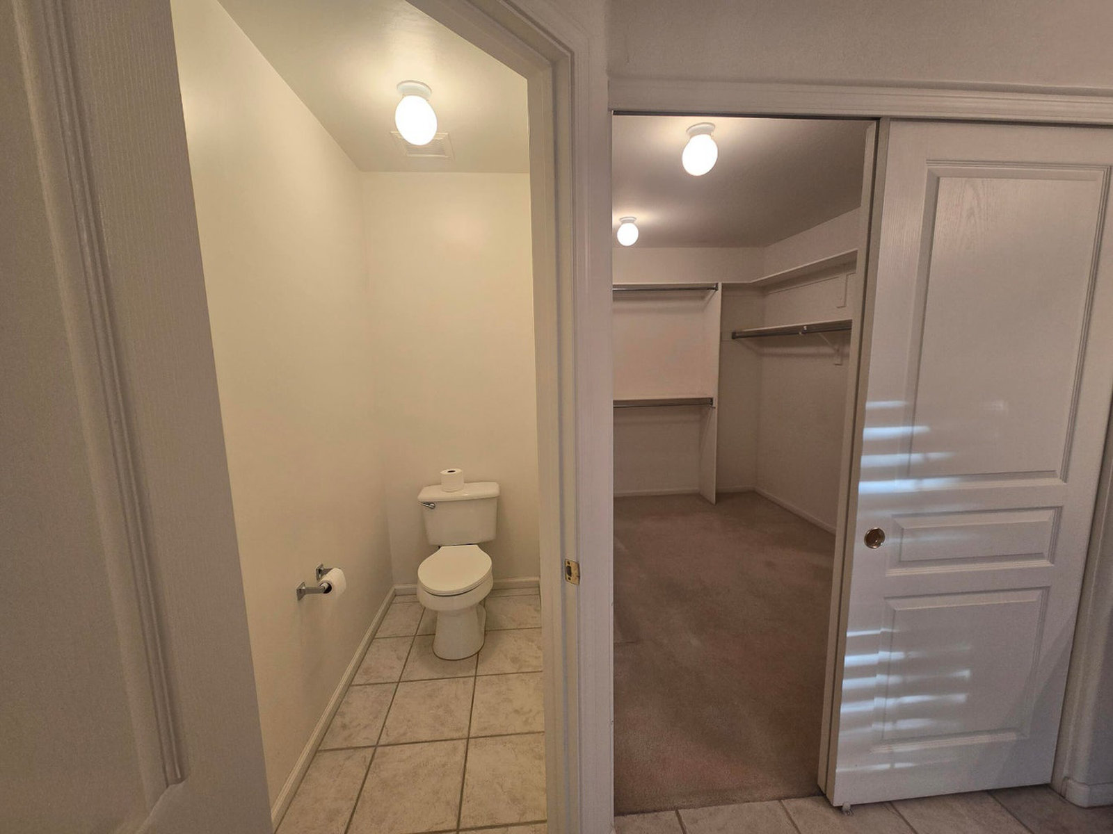 Powder room and empty walk-in closet
