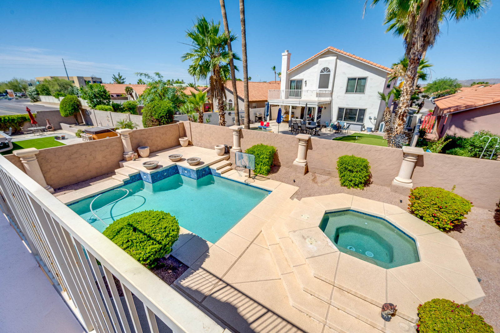 Real estate backyard with pool and hot tub in Chandler, AZ
