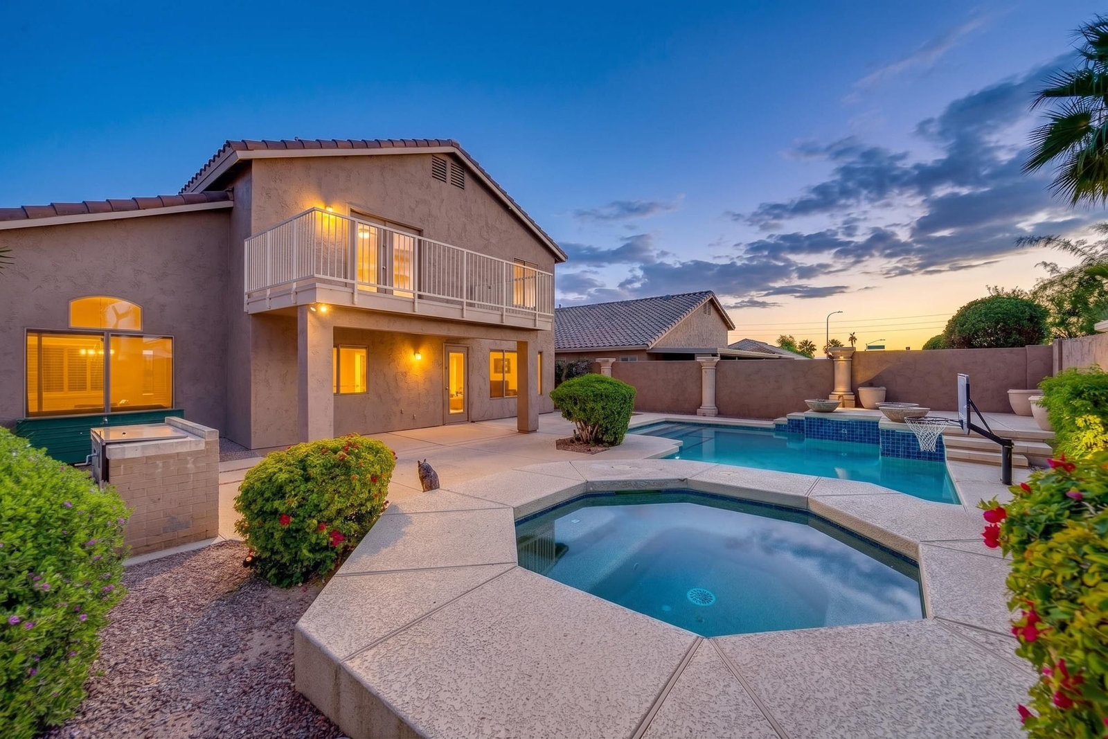 Twilight photo of Chandler AZ house with pool and spa